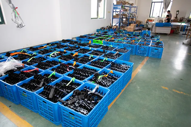 Finished straps displayed in transit baskets