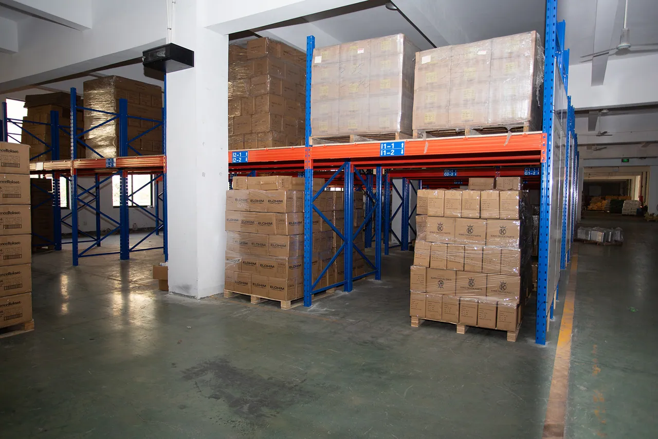 Finished straps arranged in orange transit baskets for sampling